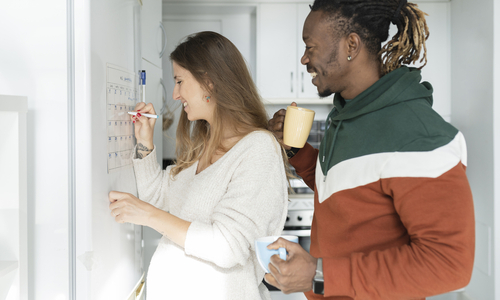 Pregnant woman smiling at clanedar.jpg